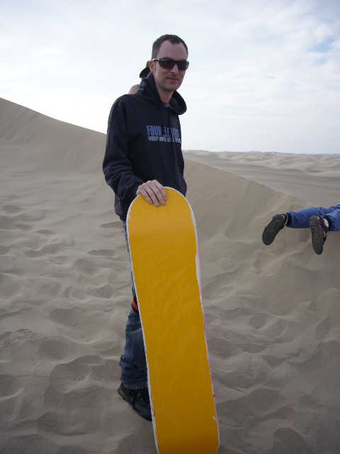 Waiting for my turn to slide down the sand